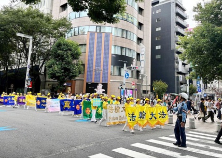 Image for article Japonsko: Lidé během průvodu v Nagoji chválili principy Falun Dafa: Pravdivost, Soucit a Snášenlivost