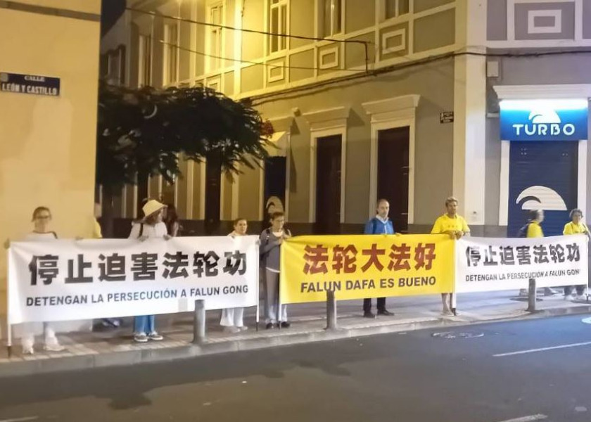 Image for article Španělsko: Policie chrání protest skupiny Falun Dafa před hotelem čínského vůdce Xi Jingpinga